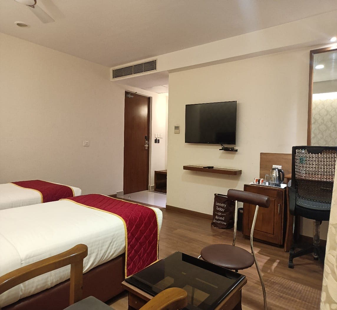 Super Deluxe room with Smart LCD TV at Thechi Hotel