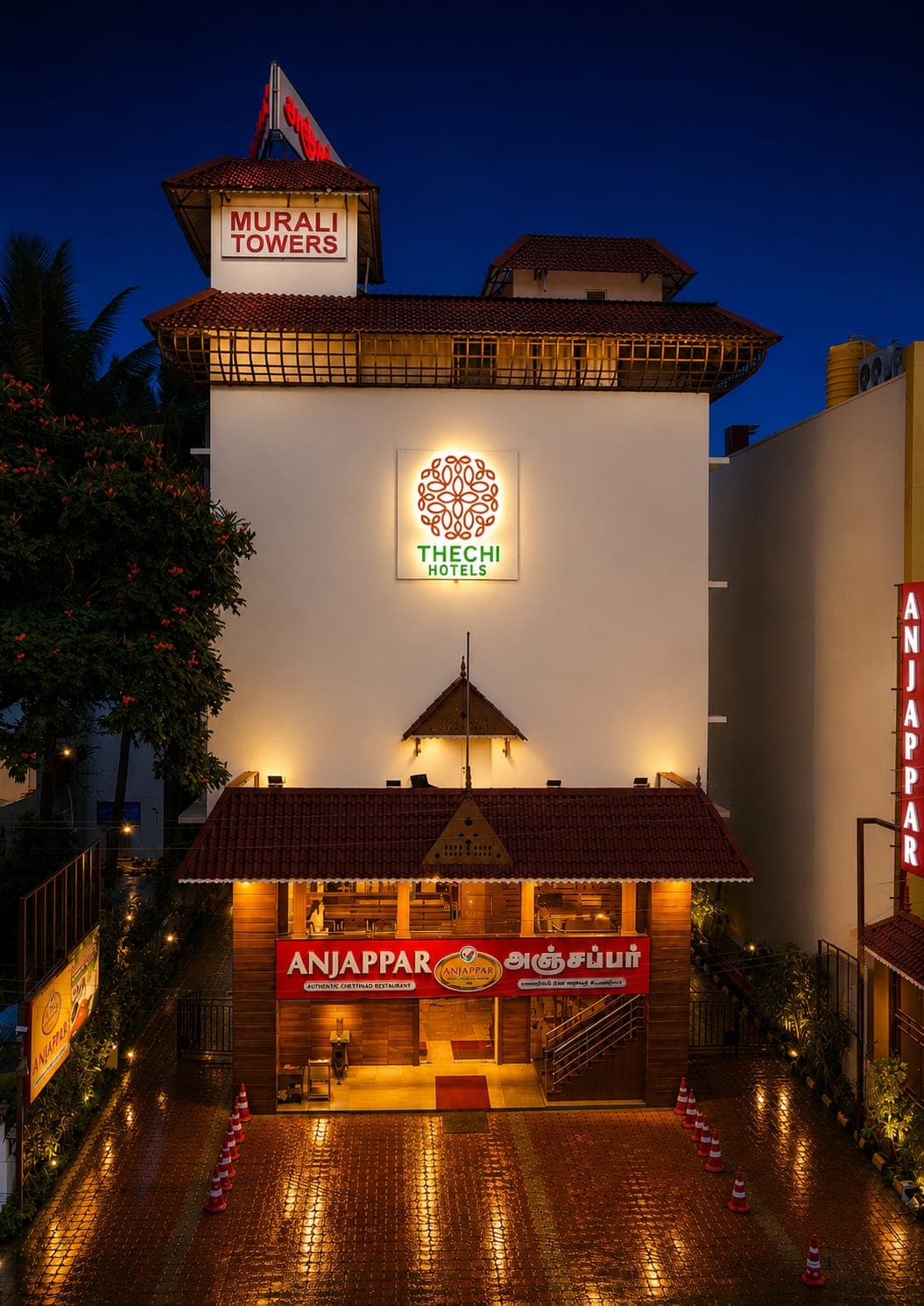 Thechi Hotel illuminated exterior at dusk, NH-44 Hosur