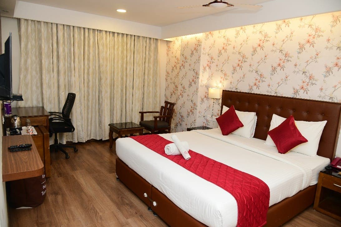 Premium King-bed room at Thechi Hotel, Hosur